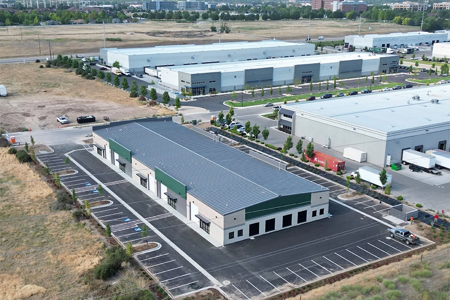 Commercial metal building workshop and flex space with concrete parking